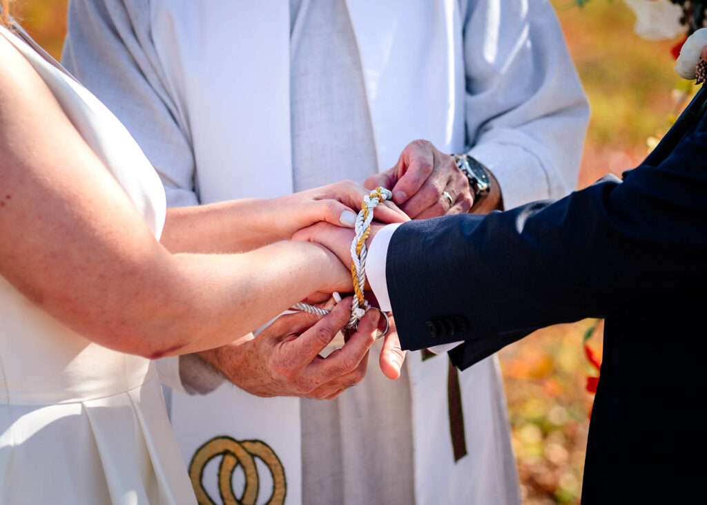 Poconos Elopement Couple with pastor Tom of Poconos Weddings LLC as part of Jim Thorpe Elopements