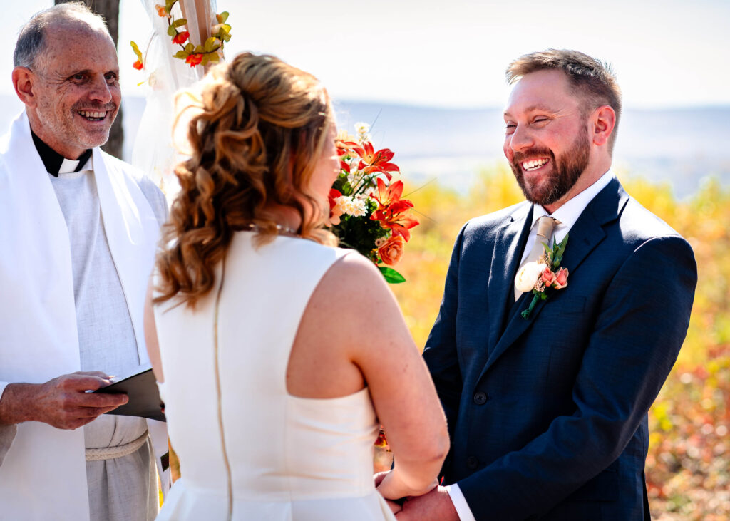 Poconos Elopement Couple with pastor Tom of Poconos Weddings LLC as part of Jim Thorpe Elopements