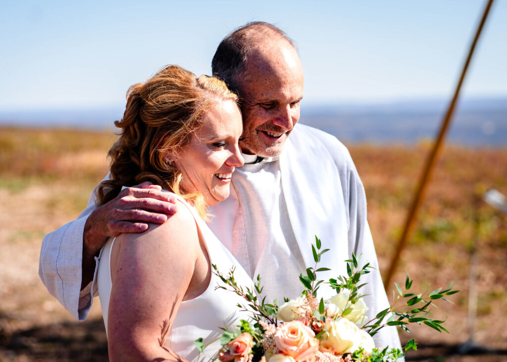 Poconos Elopement Couple with pastor Tom of Poconos Weddings LLC as part of Jim Thorpe Elopements