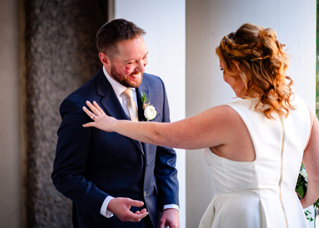 Poconos Elopement Couple's first look with Jim Thorpe Elopements